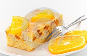 Orange fruit cake isolated