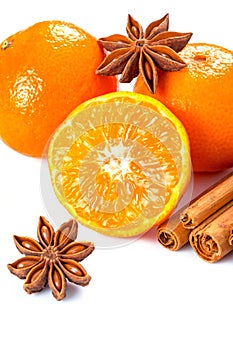 Orange fruit, cinnamon sticks and anise stars