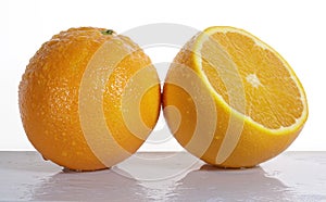 Orange fruit and half