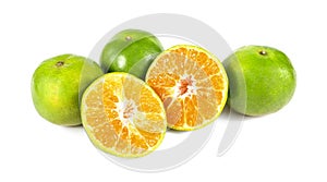 Orange fruit half and two segments isolated on white background