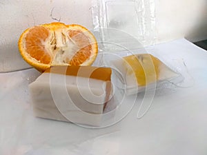 The orange fruit and Indonesia traditional cuisine is occurring in the white background