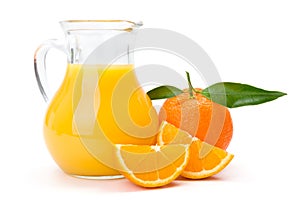 Orange fruit and jug of juice