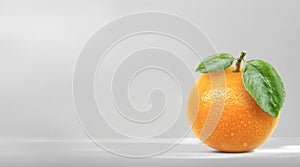 Orange fruit with leaves isolated on white background