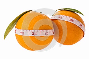 Orange fruit and measuring tape