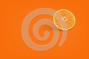 Orange fruit on orange color background