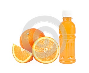 Orange fruit with Orange juice in a bottle isolated on white