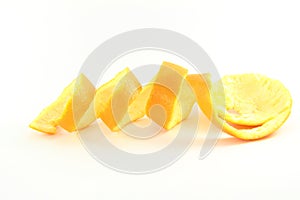 Orange fruit peels in white background