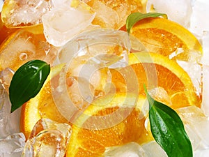 Orange fruits with ice cubes
