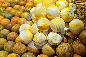 Orange fruits for sale at street market, Zanzibar, Africa