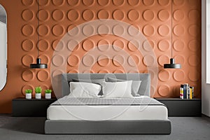 Orange geometric pattern bedroom interior