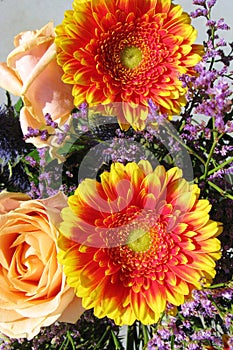 Orange gerbera flowers in a flower arrangement