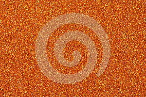 Orange glitter sparkle. Background for your design.