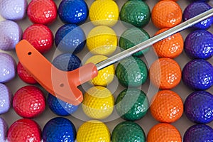 Orange Golf Club and Balls