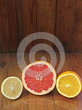 Orange grapefruit lemon divided in half. Healthful concept. Healthy lifestyle