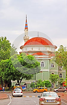 Orange and green mosque in Anyalya
