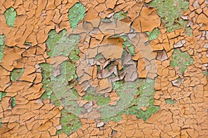 Orange and green peeling paint background