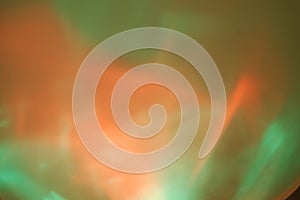 Orange Green Swirl Lighted Color Background