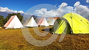 Orange and green tent on the Hill on a sunny day.in australian base camp