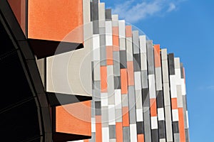 Orange, grey and white brise soleil sun breakers office building