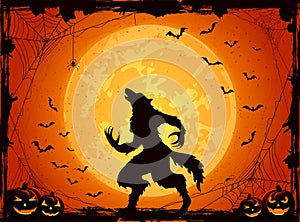 Orange Halloween background with bats and werewolf photo