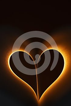 Orange heart shape with black background