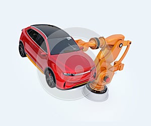 Orange heavyweight robotic arm carrying red SUV for assembly photo