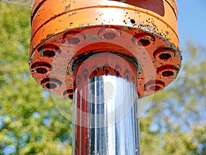 Orange hydraulic cylinder