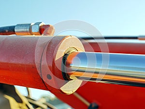 Orange hydraulic cylinder