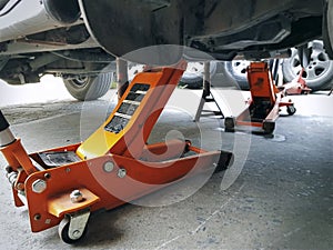 Orange Hydraulic Jacks for Car Repair Service