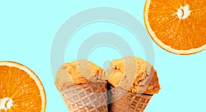 Orange ice cream over blue background