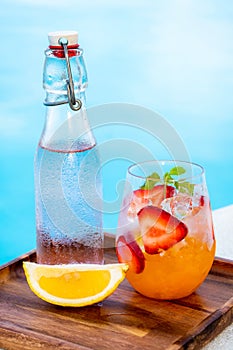 orange italian soda with fresh strawberry