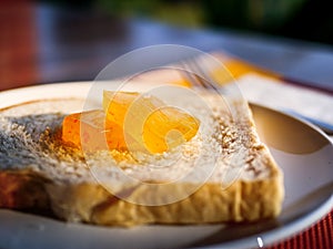 Orange jam on the bread
