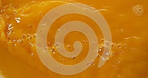 Orange Juice being poured