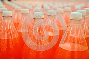 Orange juice beverage plastic bottle in factory