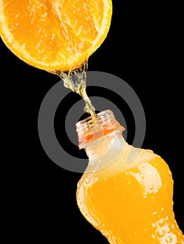 Orange juice on a black background