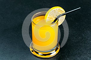 Orange juice on blue table
