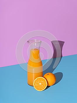 Orange juice bottle isolated on a vibrant background