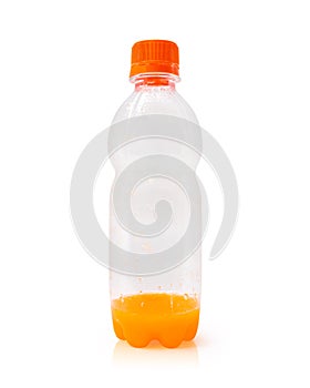 Orange juice bottle isolated on white background. Container of fresh fruit drink. Clipping paths object. Left over concept