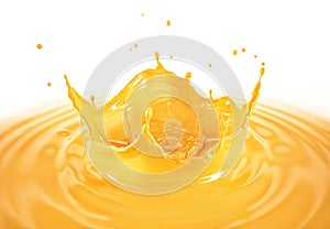 Orange juice crown splash with ripples. On white background