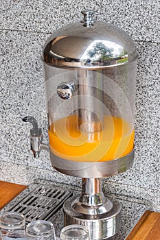 Orange juice in dispensers