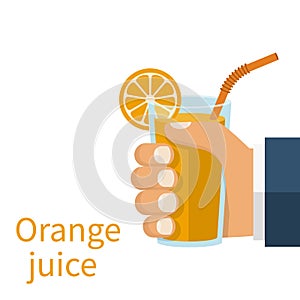 Orange juice in a glass cup hold in hand