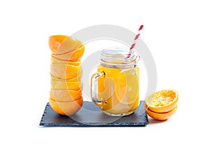Orange juice in glass on isolated white background photo
