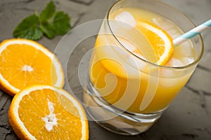 Orange juice in glass with mint, fresh fruits. selective focus,