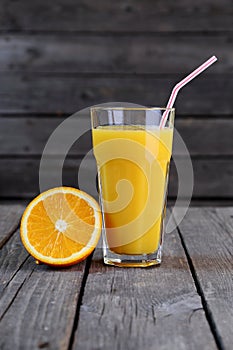 Orange juice and half an orange