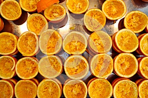 The orange juice that has been squeezed Arranged on top of stainless steel