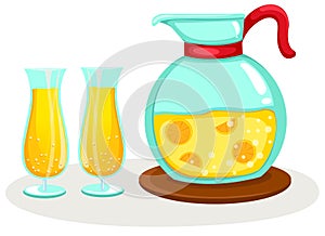 Orange juice in a jug and glasses