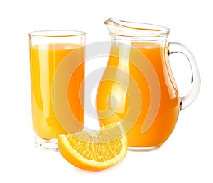 orange juice with orange slices isolated on white background. juice in jug