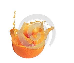 Orange juice splash inside an half orange