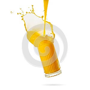 orange juice splash isolated on white. glass of splashing orange juice. close up. stock photo
