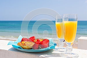 Orange juice, Strawberies and Pastel de Nata